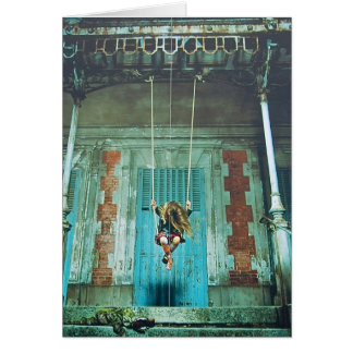 Mädchen auf einer Schwingen-Karte