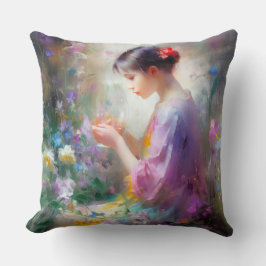 Mädchen bewundert eine Blume in ihren Händen Kissen