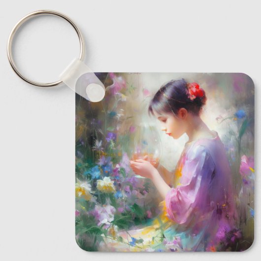 Mädchen bewundert eine Blume in ihren Händen Schlüsselanhänger (Vorderseite)