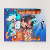 Mädchen, das am Puzzle des Strandjigsaw sitzt (Horizontal)