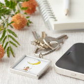 Mädchen, das auf einem Seil hängt vom Schlüsselanhänger (Seite)