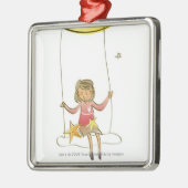 Mädchen, das auf einem Seil hängt vom Silbernes Ornament (Links)