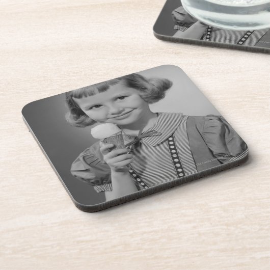 Mädchen, das Eiscreme isst Untersetzer (Linke Seite)