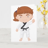 Mädchen, das Karate-Gruß-Karten tut Karte (Gelbe Blume)