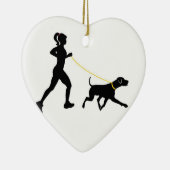 Mädchen, das mit ihrer Hundeverzierung läuft Keramik Ornament (Rechts)