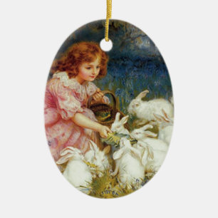 Mädchen füttert Kaninchen Keramik Ornament