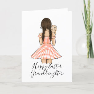 Mädchen in orangefarbenem Gingham-Karo, das ein Ha Feiertagskarte