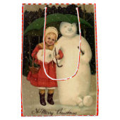 Mädchen in Red Coat mit Snowman, weiße Weihnachten Mittlere Geschenktüte (Rückseite)