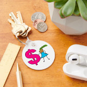 Mädchen mit einem Dollar-Zeichen Schlüsselanhänger