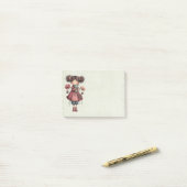 Mädchen mit einer Froschpuppe Niedlich Whimsical Post-it Klebezettel (Auf Schreibtisch)