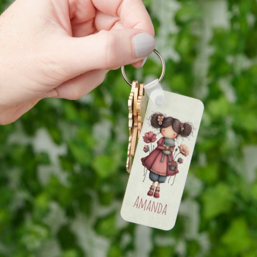 Mädchen mit einer Froschpuppe Niedlich Whimsical Schlüsselanhänger (Hand)