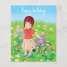 Mädchen mit Fahrrad auf einer blühenden Wiese