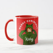 Mädchen mit Green Frog Hoodie Zeichnend Weihnachte Tasse (Links)