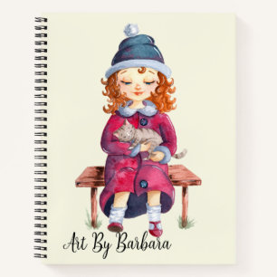 Mädchen mit Katzenzeichnung Notizblock