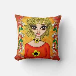 Mädchen mit orangefarbenem Shirt und gelber weißer Kissen
