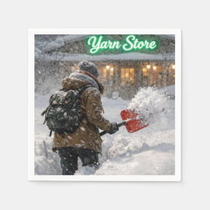 Mädchen schaufelt Schnee vor einem Yarn-Store Serviette