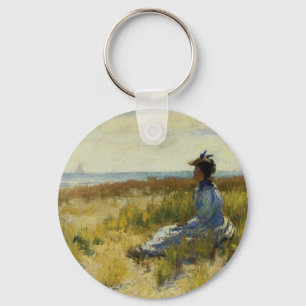 Mädchen sitzt am Meer Schlüsselanhänger