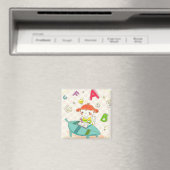 Mädchen sitzt auf dem Stuhl und lernt Magnet (In Situ (Geschirrspüler))