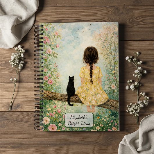 Mädchen und Katze im Frühlingsgarten Notizblock