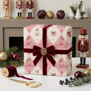 Mädchenhafter Weihnachtsnussknacker Zuckerpflaume Geschenkpapier