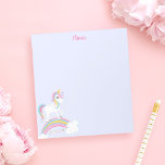 Magischer Regenbogen Einhorn Lila Personalisiert Notizblock<br><div class="desc">Niedliches Einhorn-Notizblock mit Sternen und Regenbogen auf lila Hintergrund. Personalisieren Sie mit ihrem Namen,  um ein lustiges Geschenk für ein Mädchen zu machen!</div>