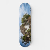 Malerisches Haus auf einem tropischen Korallenriff Skateboard (Vorderseite)