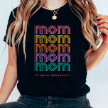 Mama | Farbiger Text im Bright Disco-Stil T-Shirt<br><div class="desc">Dieses lustige und stilvolle schwarze Shirt sagt fünfmal "Mama",  in Retro inspiriert leuchtenden Farben wie Rosa,  Gelb,  Orange,  lila und Türkis und trendige Disco-Stil Typografie. Fügen Sie die Namen Ihrer Kinder hinzu,  um zu zeigen,  wie stolz Sie sind,  ihre Mutter zu sein.</div>