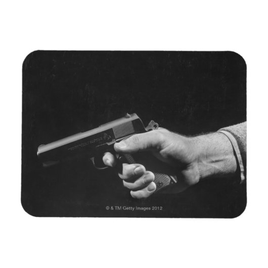 Man Holding Gun Magnet (Horizontal)