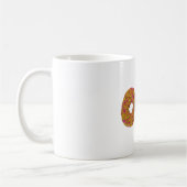Man isst Doughnut Kaffeetasse (Links)