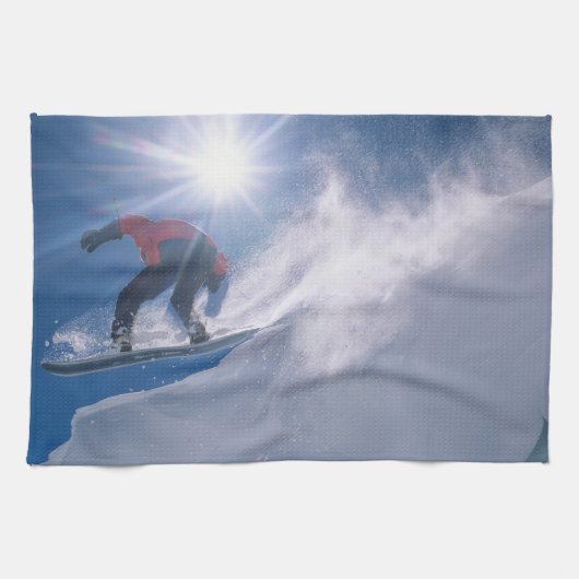 Man springt von einer großen Ecke auf einem Snowbo Geschirrtuch (Horizontal)