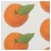 Mandarine mit grünem Blattwerk Stoff (Nahaufnahme)