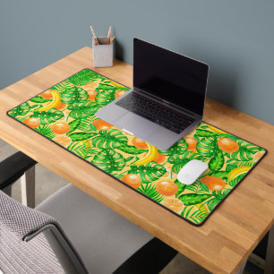 Mandarinen, Bananen und tropische Blätter Schreibtischunterlage