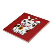 Maneki Neko Katze auf rotem Hintergrund Fliese (Seite)