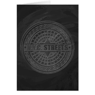 Manhole deckt schwarzen Marmor ab