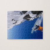 Mann auf einem Snowboard springt von einem Korn Puzzle (Horizontal)