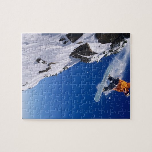 Mann auf einem Snowboard springt von einem Korn Puzzle (Horizontal)