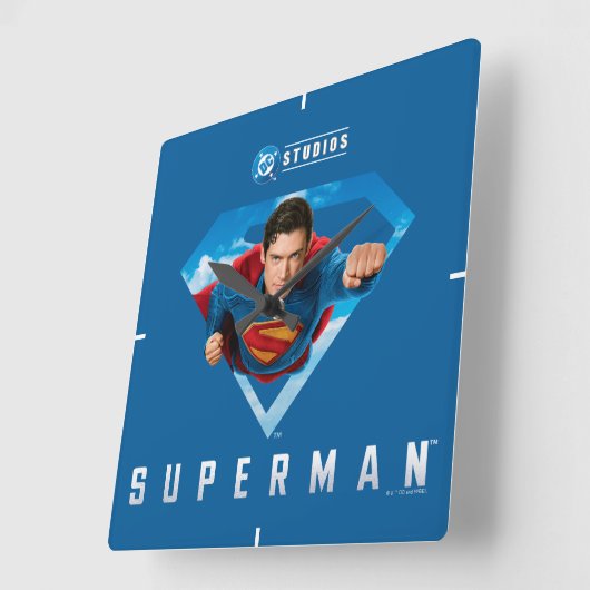 Mann aus Stahl im Flug Quadratische Wanduhr (Winkel)