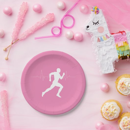 Mann, der die Silhouette der Läufer auf rosa Hinte Pappteller (Party)