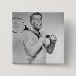 Mann hält Tennisschläger Button