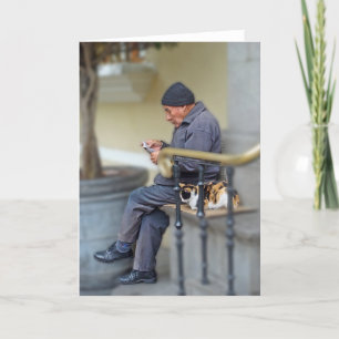 Mann mit seiner Katze - Lesen der Zeitung Karte