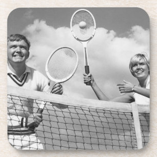 Mann und Frau, die Tennis spielen Getränkeuntersetzer