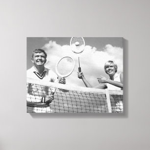 Mann und Frau, die Tennis spielen Leinwanddruck