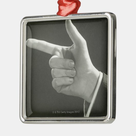 Mann-Zeigen Silbernes Ornament (Links)