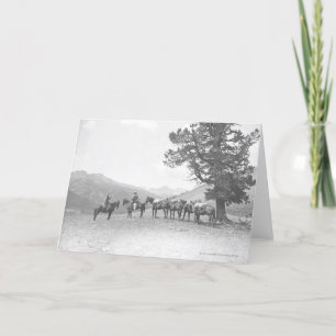 Männer mit den Packhorses, die über einem Hügel Karte