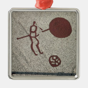 Männliche Zahl mit der Sonne Ornament Aus Metall