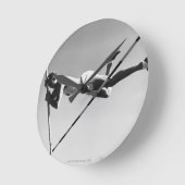 Männlicher Stabhochspringer Runde Wanduhr (Winkel)