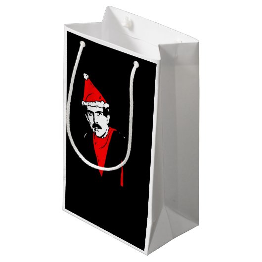 Manos bringt kleine Vorlagengeschenk-Tasche zurück Kleine Geschenktüte (Vorderseite Schrägansicht)