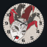 Mardi Gras Jester Mask Venetian Carnival Große Wanduhr<br><div class="desc">Keep track of time with a touch of mystery using this Mardi Gras jester mask wall clock. This decorative timepiece features a detailed red and black Venetian mask illustration set against an ornate paisley pattern. It is a perfect functional art piece for a game room, home office, or any space...</div>