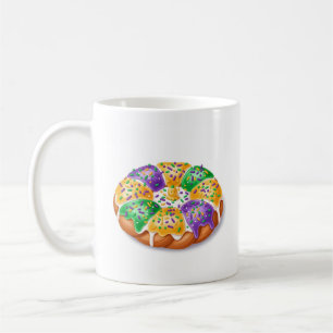 Mardi Gras King Cake mit Plastik-Baby-Feiertags-Ta Kaffeetasse