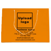 Markenbezeichnung für orange farbige Großverpackun Große Geschenktüte (Vorderseite)